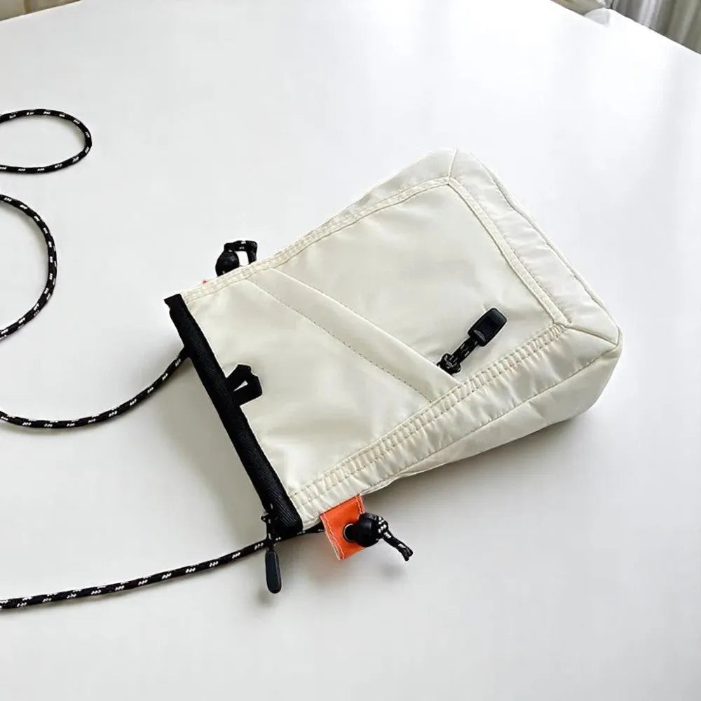 Bolso para Móvil de Nylon – Elegancia Minimalista y Seguridad Premium
