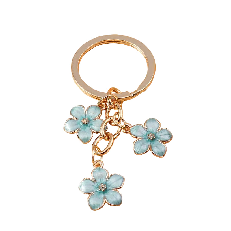 Charm de Flor Sakura Azul Cielo: El Toque Distintivo para tu Bolso