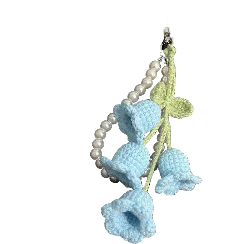 Orquídea de Crochet Azul con Perlas: Elegancia Artesanal