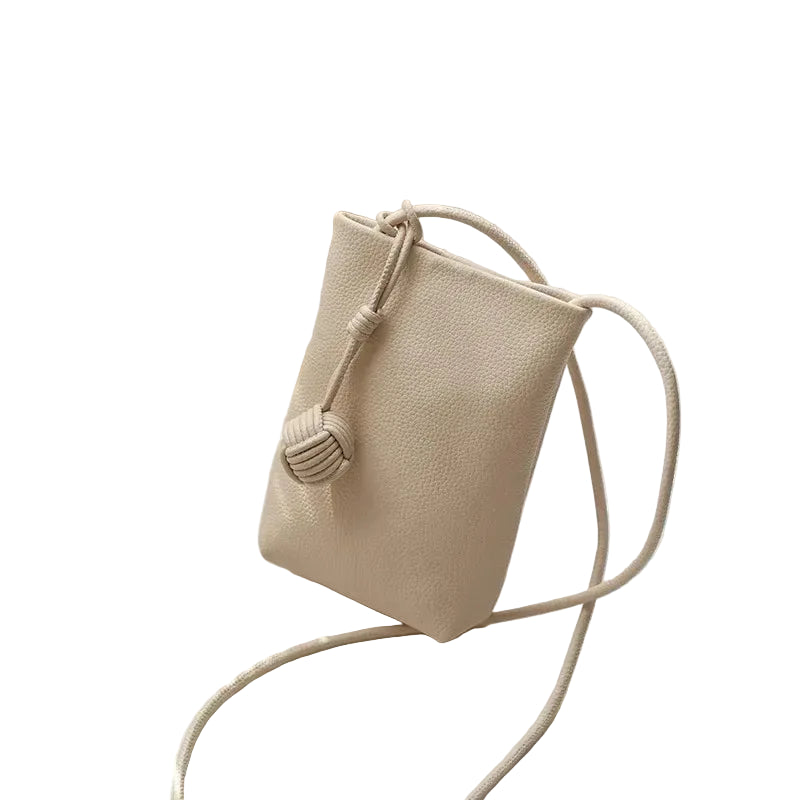 Bolso Bandolera Premium con Borla – Elegancia Casual en Negro y Beige